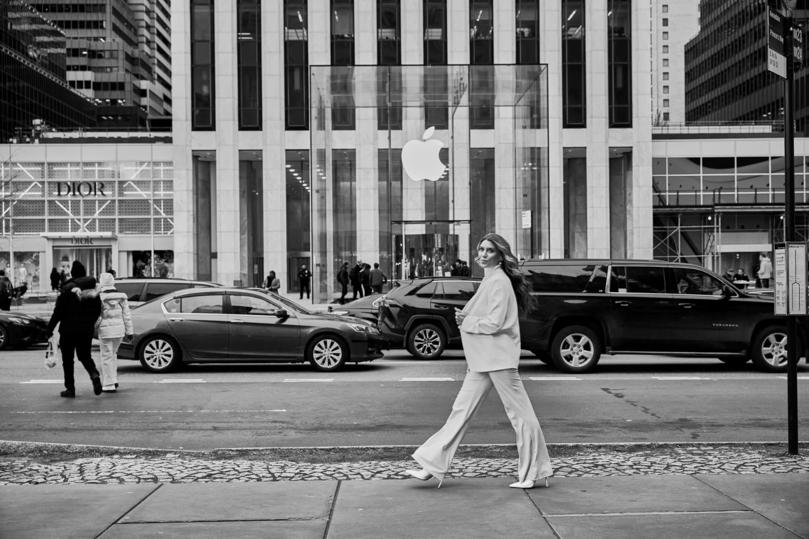 Katy Saeger walking in front of Apple store